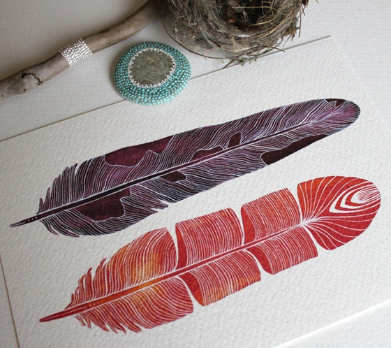 Feathers and stones painted by Marisa Redondo