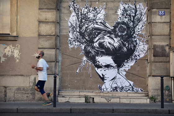 Street art and paper cut by Monsieur Qui